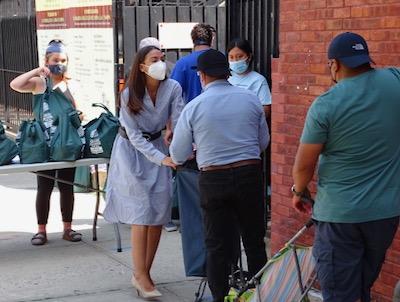 nyc reopening corona virus nyc covid 19 nyc nys aoc in corona hands out food bags